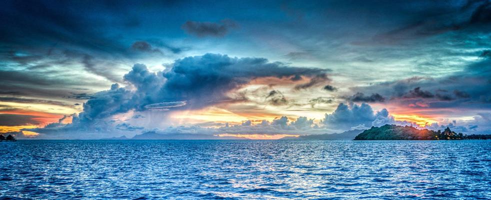 photo of ocean and clouds sunset